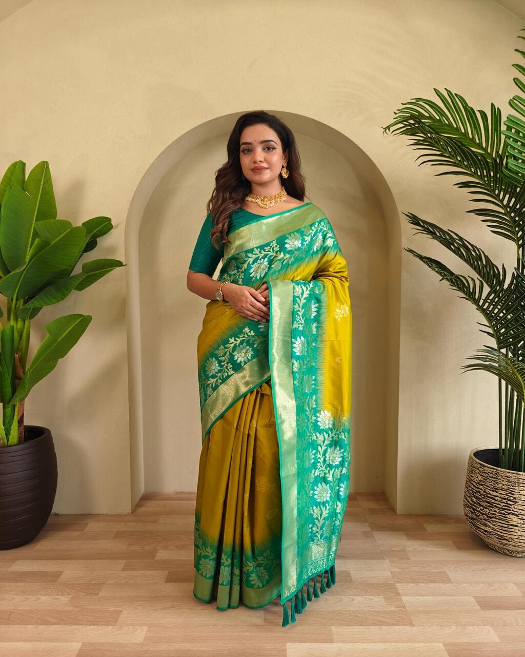 Dual tone silk saree in elegant contrast colors with zari weave, tassels, and wedding style