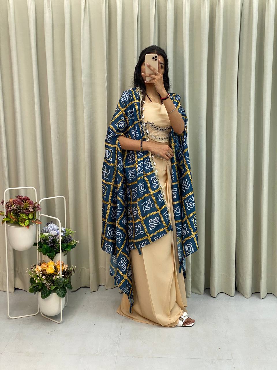 Cream Indo Western three piece outfit with embroidered blouse, dhoti and printed cape