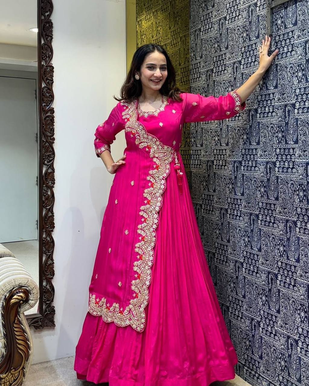 Elegant pink designer gown with foil work, perfect for weddings and festive occasions