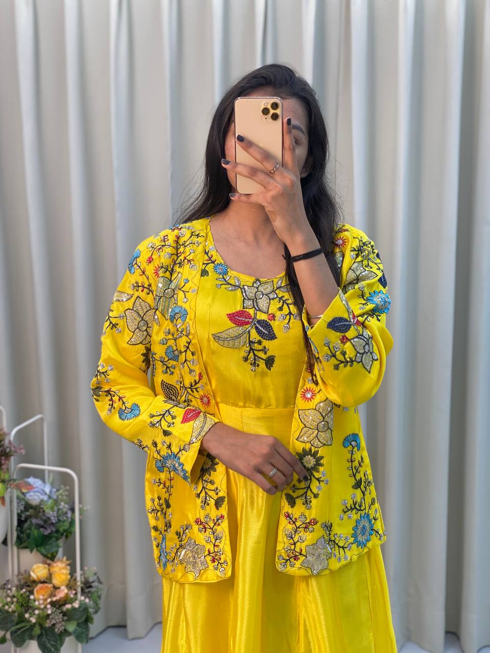 Elegant yellow chinon gown with fancy koti, ideal for wedding and festive occasions.