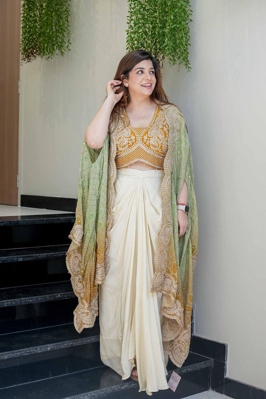 Mustard three piece Indo Western set with tube blouse, draped skirt, and shrug