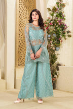 Stylish pastel green plazzo set with embroidered top and matching blouse