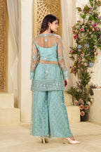 Pastel green partywear top with plazzo set and blouse in butterfly embroidery style