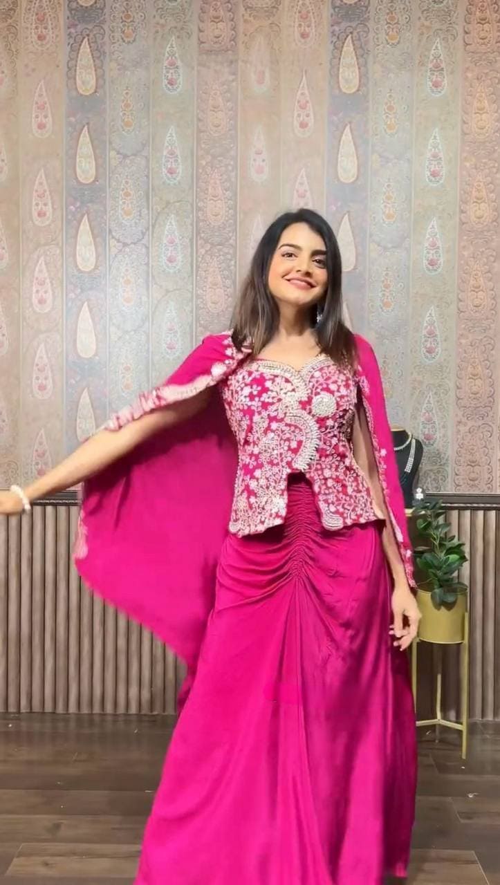 Pink Indo Western wedding wear for women featuring stylish koti, blouse and dhoti skirt