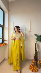 Mustard colored trendy Indo Western outfit for wedding with fancy blouse and plated dhoti