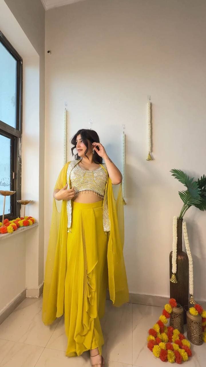Mustard colored trendy Indo Western outfit for wedding with fancy blouse and plated dhoti