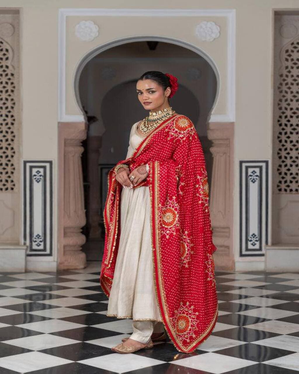 Festive wear cream gown set for women with chinon fabric and bandhani dupatta