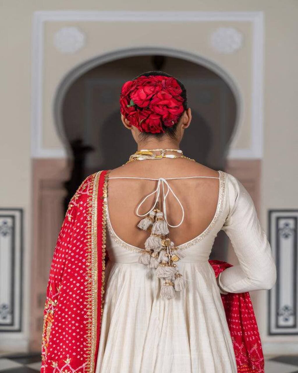 Designer cream gown with micro inner and red bandhani dupatta – ideal for parties