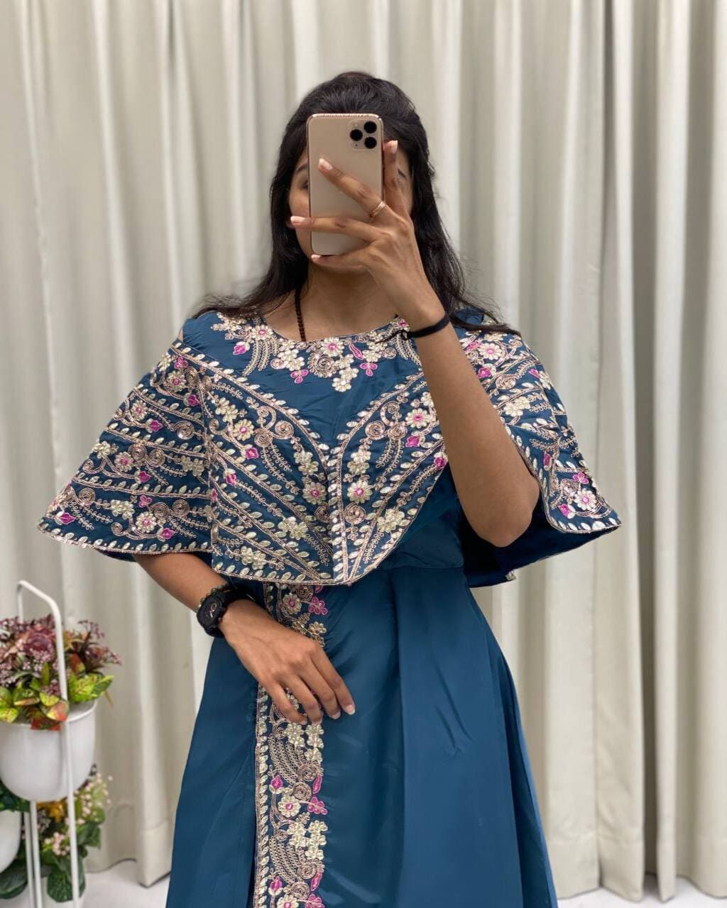 Designer blue gown with foil work, perfect for festive wear and celebrations