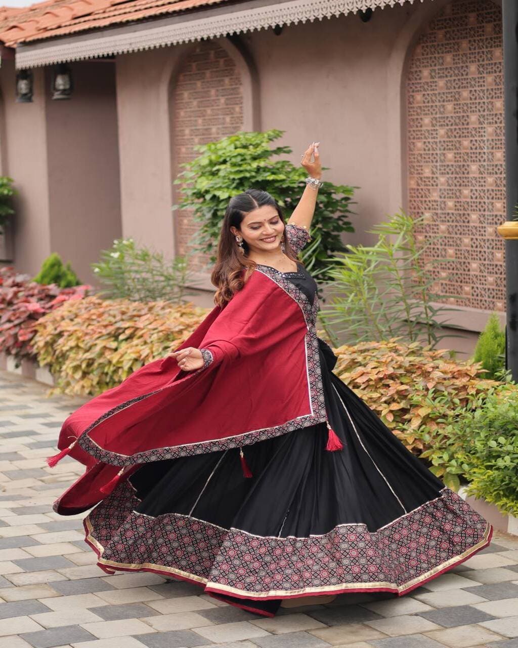 Stylish Ajrakh Printed Black Lehenga Choli with Red Dupatta for Festive Wear