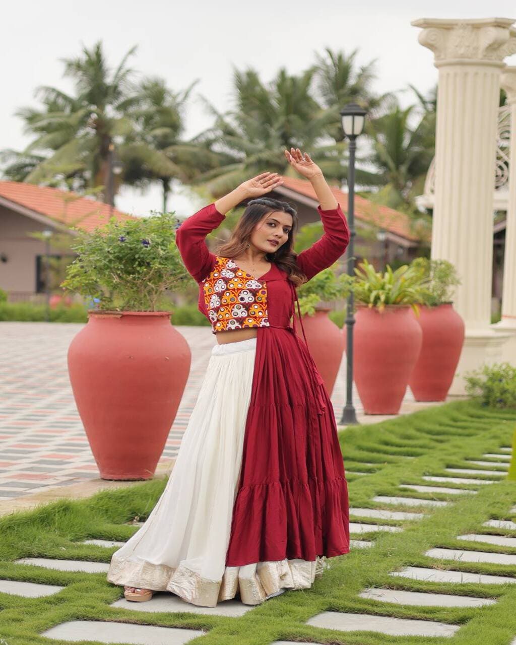 Elegant red lehenga choli with Gamathi mirror work for Navratri and dandiya events