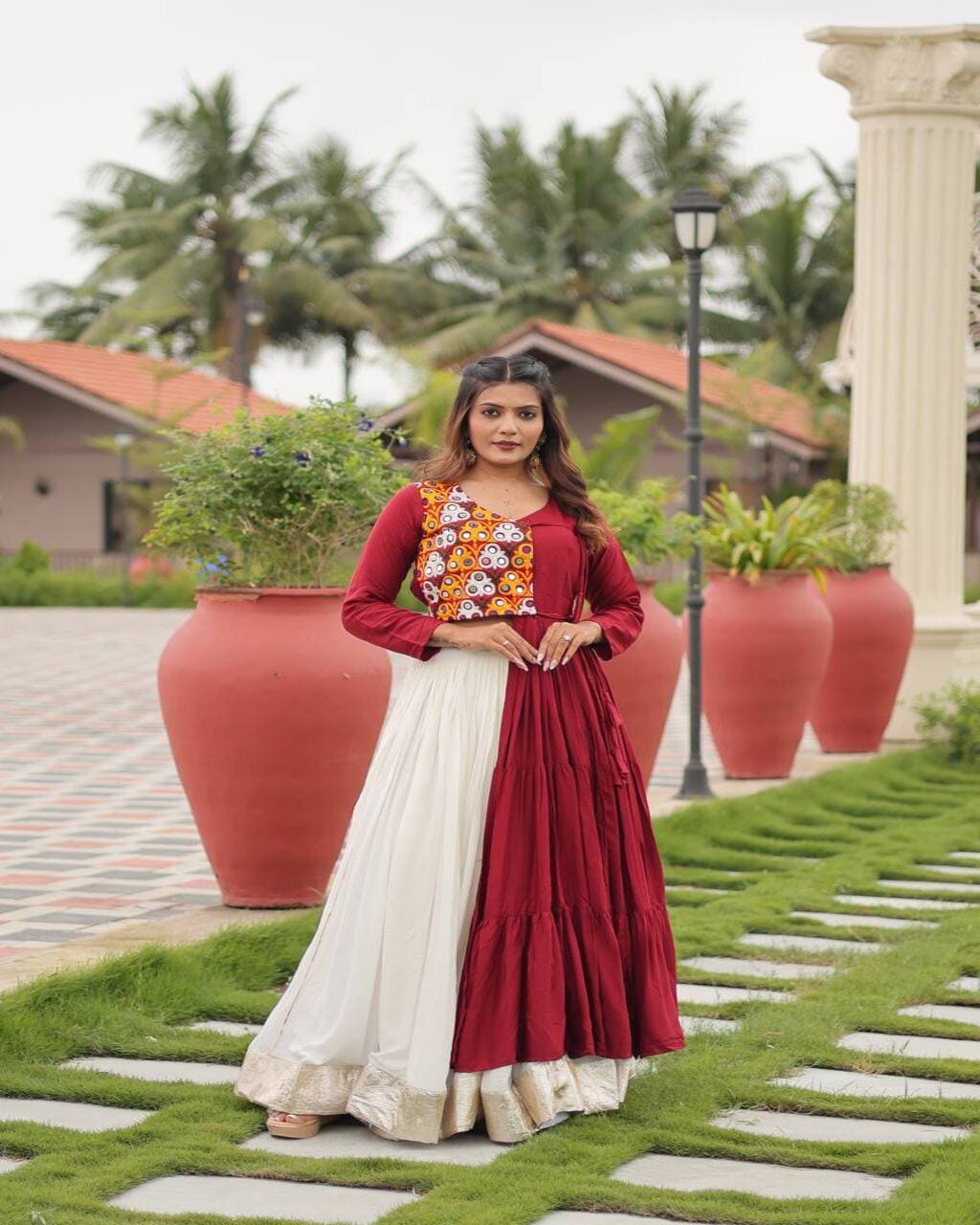Red ethnic lehenga choli with mirror embroidery for traditional Navratri occasions