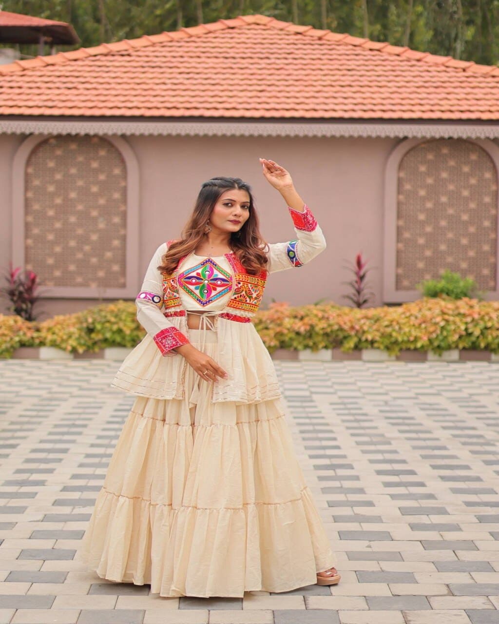 Cream ethnic gamthi work lehenga choli set with koti, ideal for Garba and festivals