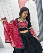 Navratri special embroidered black and red lehenga choli in cotton with mirror work