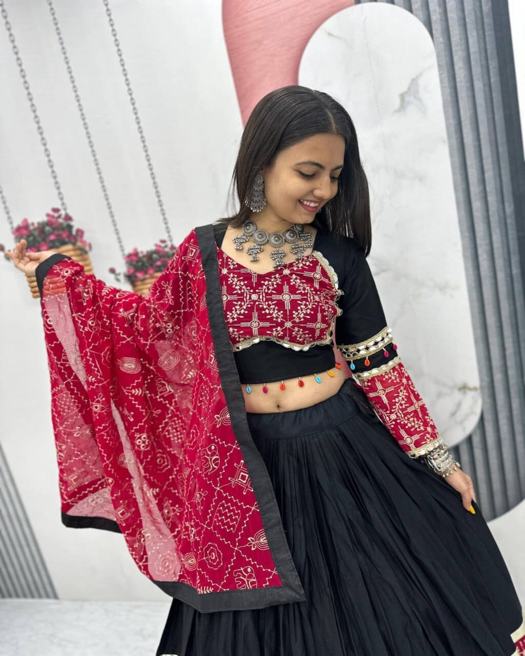 Navratri special embroidered black and red lehenga choli in cotton with mirror work