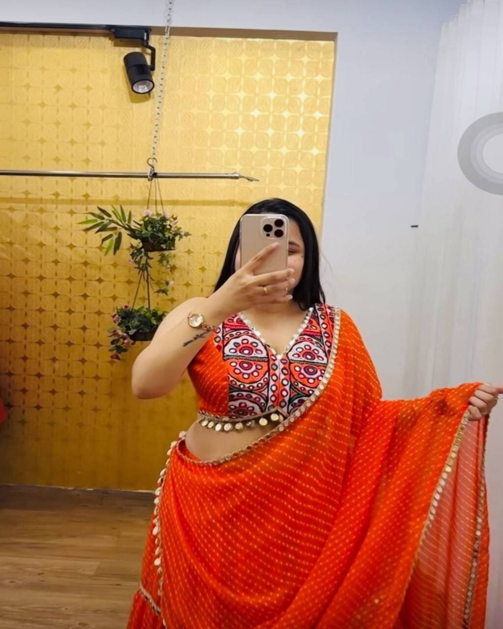 Orange mirror work lehenga choli in georgette fabric for Navratri and Garba nights