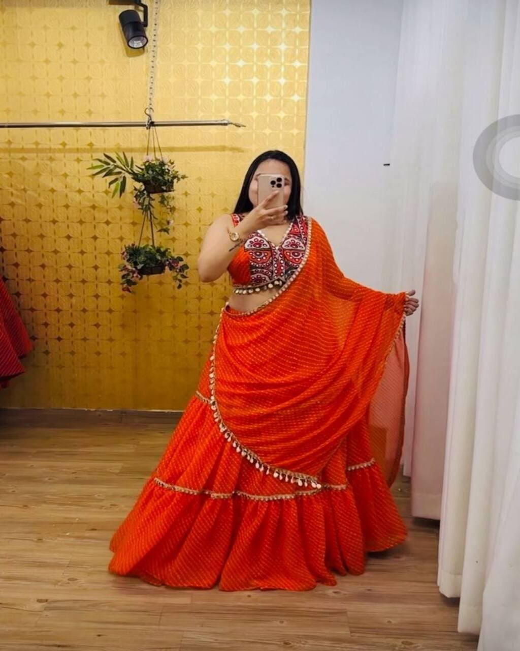 Traditional orange georgette lehenga choli with real mirror work for Navratri