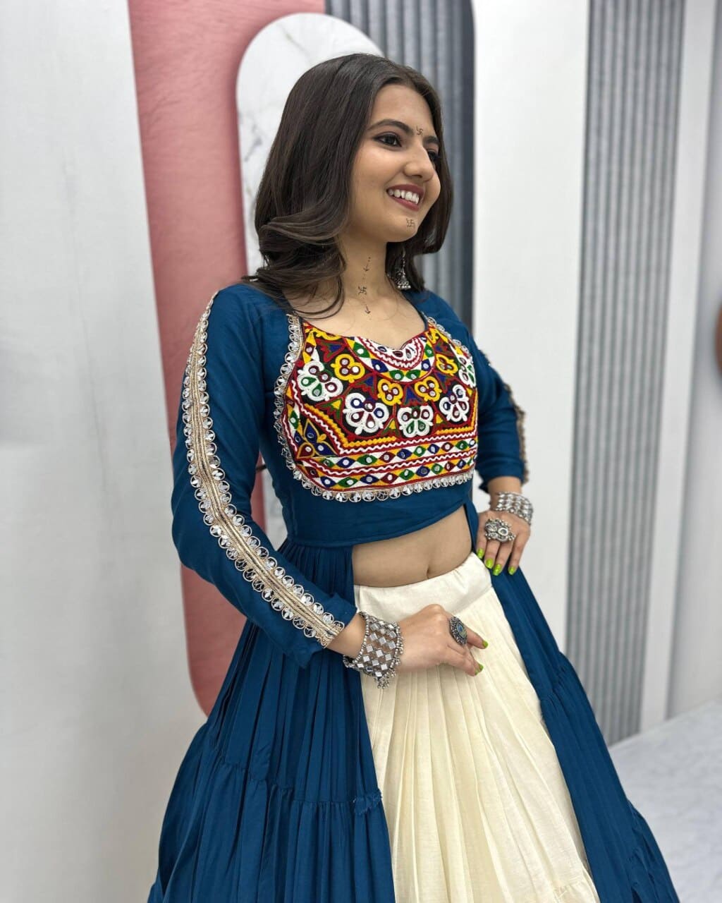 Traditional blue lehenga choli with Gamathi embroidery for Navratri festival