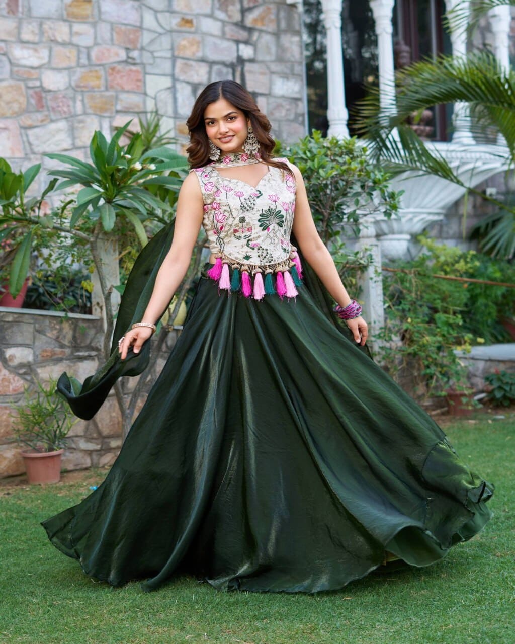 Mehndi green lehenga choli with silk fabric and heavy embroidery for festive wear