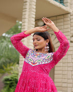 Designer pink embroidered gown with mirror detailing ideal for navratri garba look