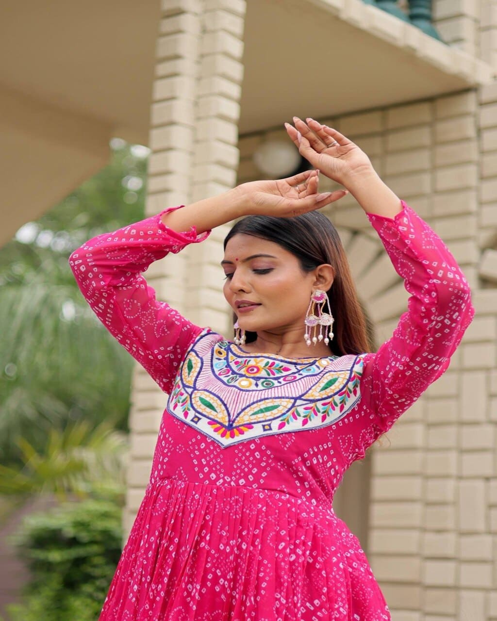 Designer pink embroidered gown with mirror detailing ideal for navratri garba look