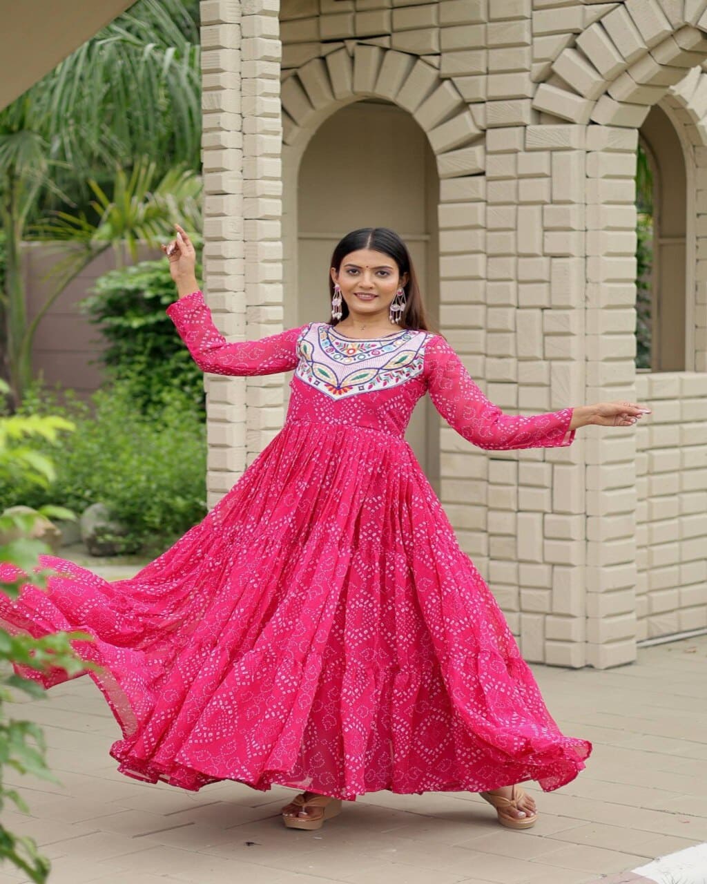 Pink georgette gown with embroidery mirror work perfect for navratri celebrations