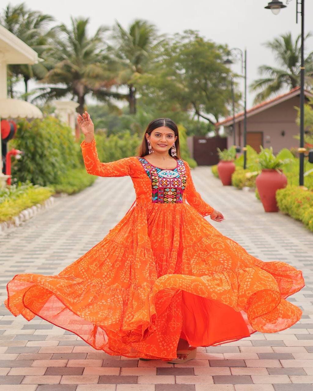 Navratri Special Orange Gown with embroidery thread work and mirror details