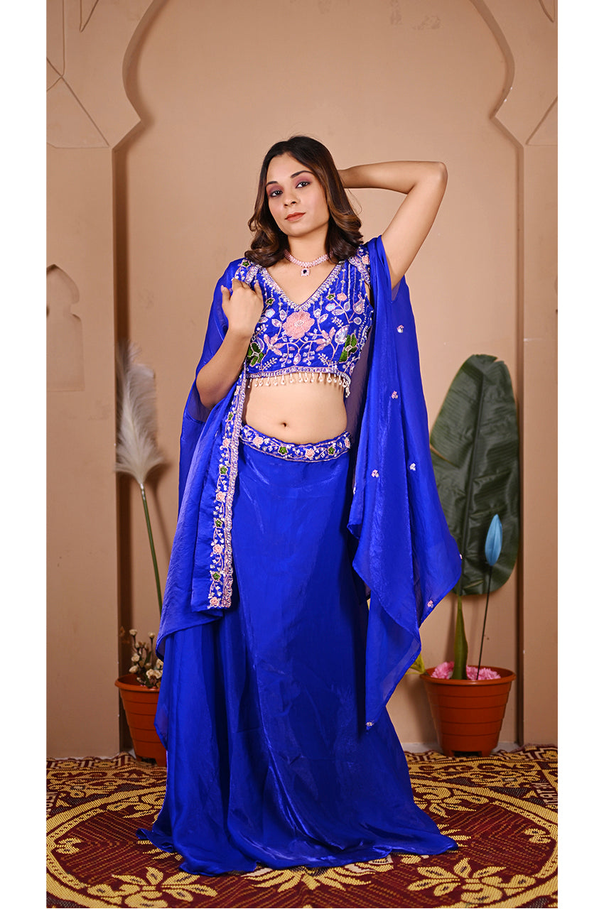 Blue indo western lehenga set front view with designer blouse beads work and flowy lehenga for wedding wear