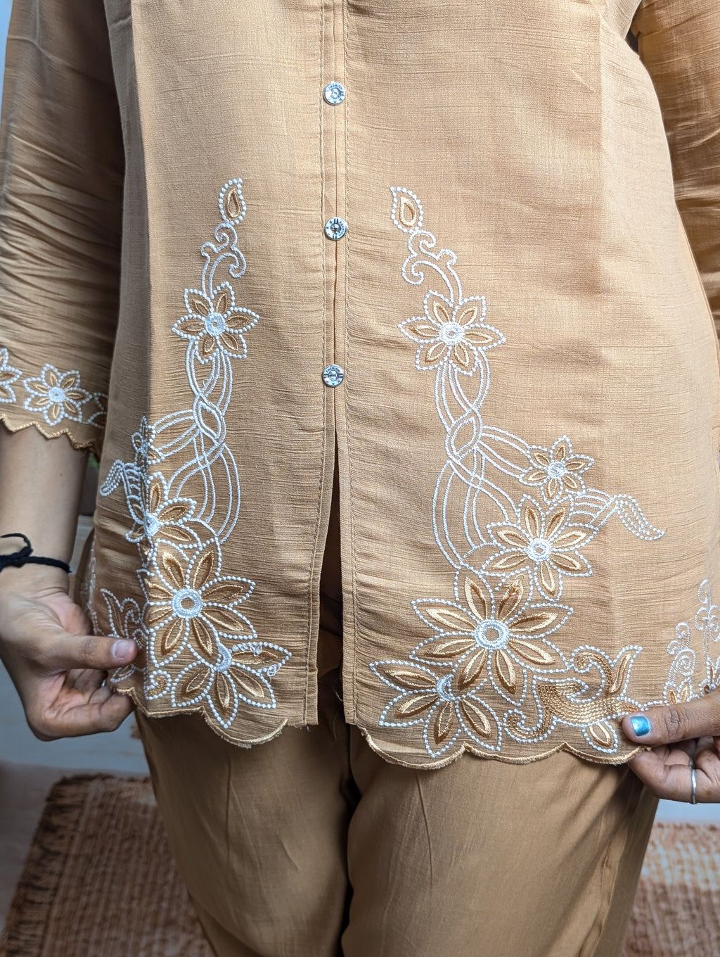 Premium dark cream embroidery work closeup on Royal Siffon fabric with elegant designer detailing