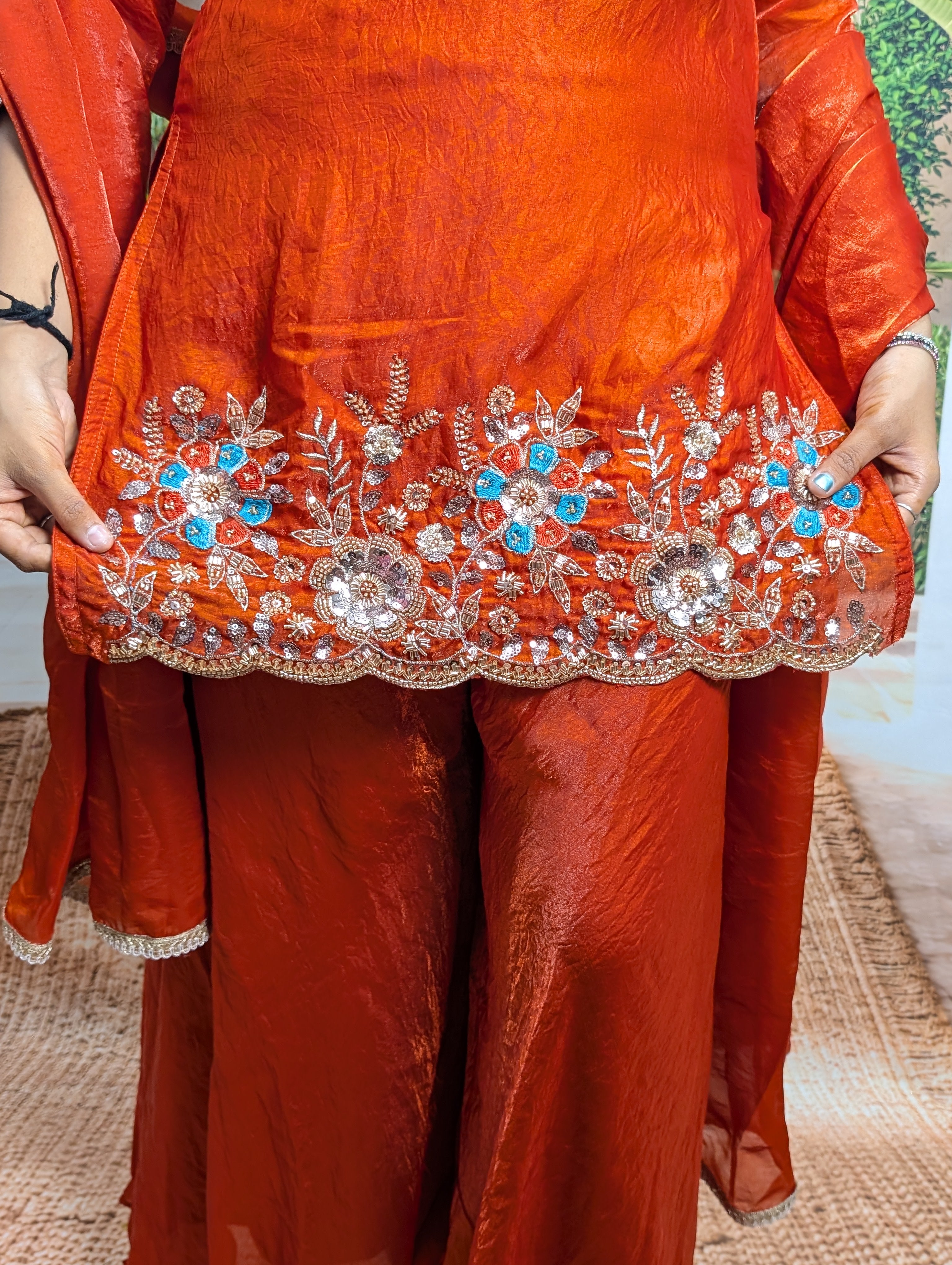 Designer rust orange heavy beaded daman work on premium Fendy fabric with elegant traditional detailing