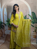 Premium luxury yellow ethnic palazzo suit for women with elegant beads work and stylish festive wear look