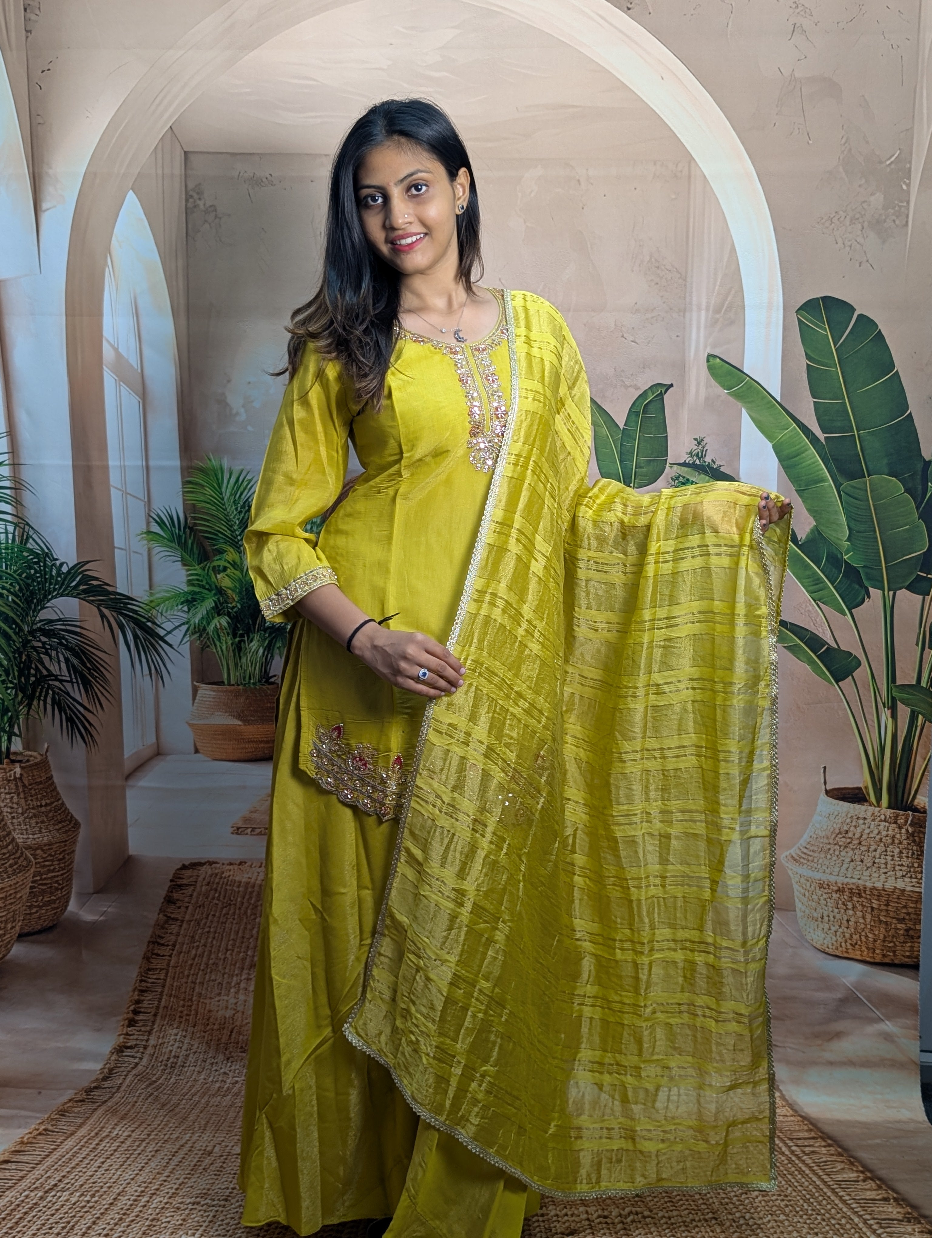 Premium luxury yellow ethnic palazzo suit for women with elegant beads work and stylish festive wear look