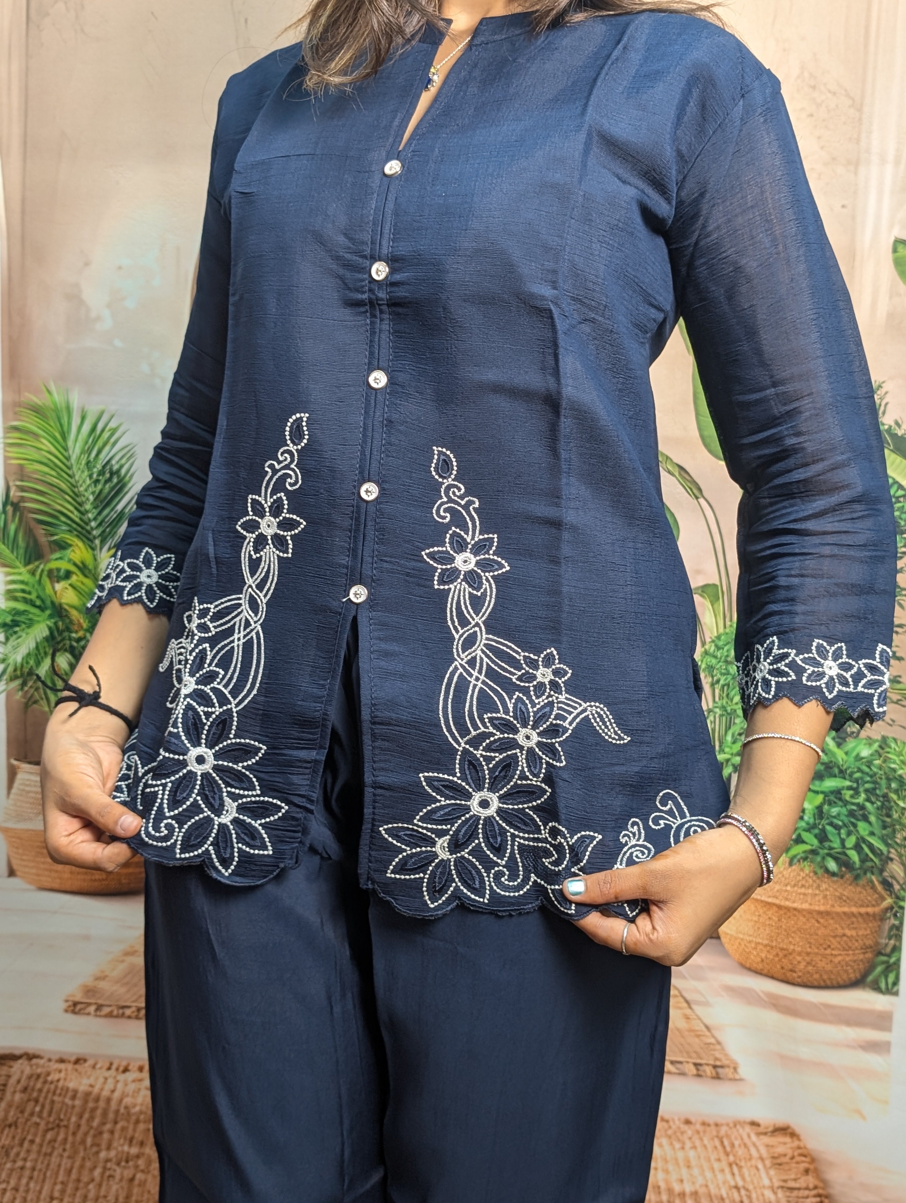 Premium navy blue embroidery work closeup on Royal Siffon fabric with elegant designer craftsmanship