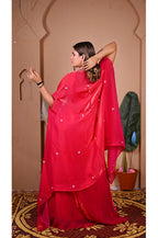 Pink indo western lehenga set back full look showing complete outfit with shrug and lehenga for festive wear