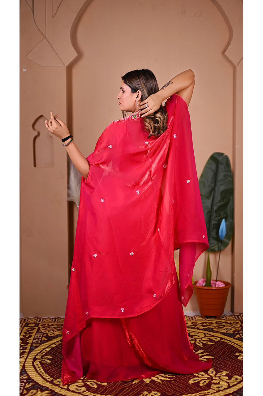 Pink indo western lehenga set back full look showing complete outfit with shrug and lehenga for festive wear