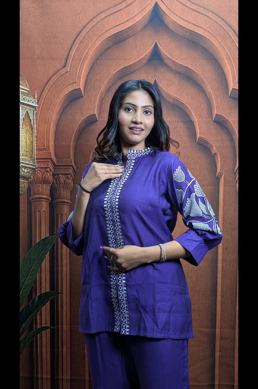 Detailed heavy embroidery work on premium purple Vartican co-ord set for women with elegant designer craftsmanship