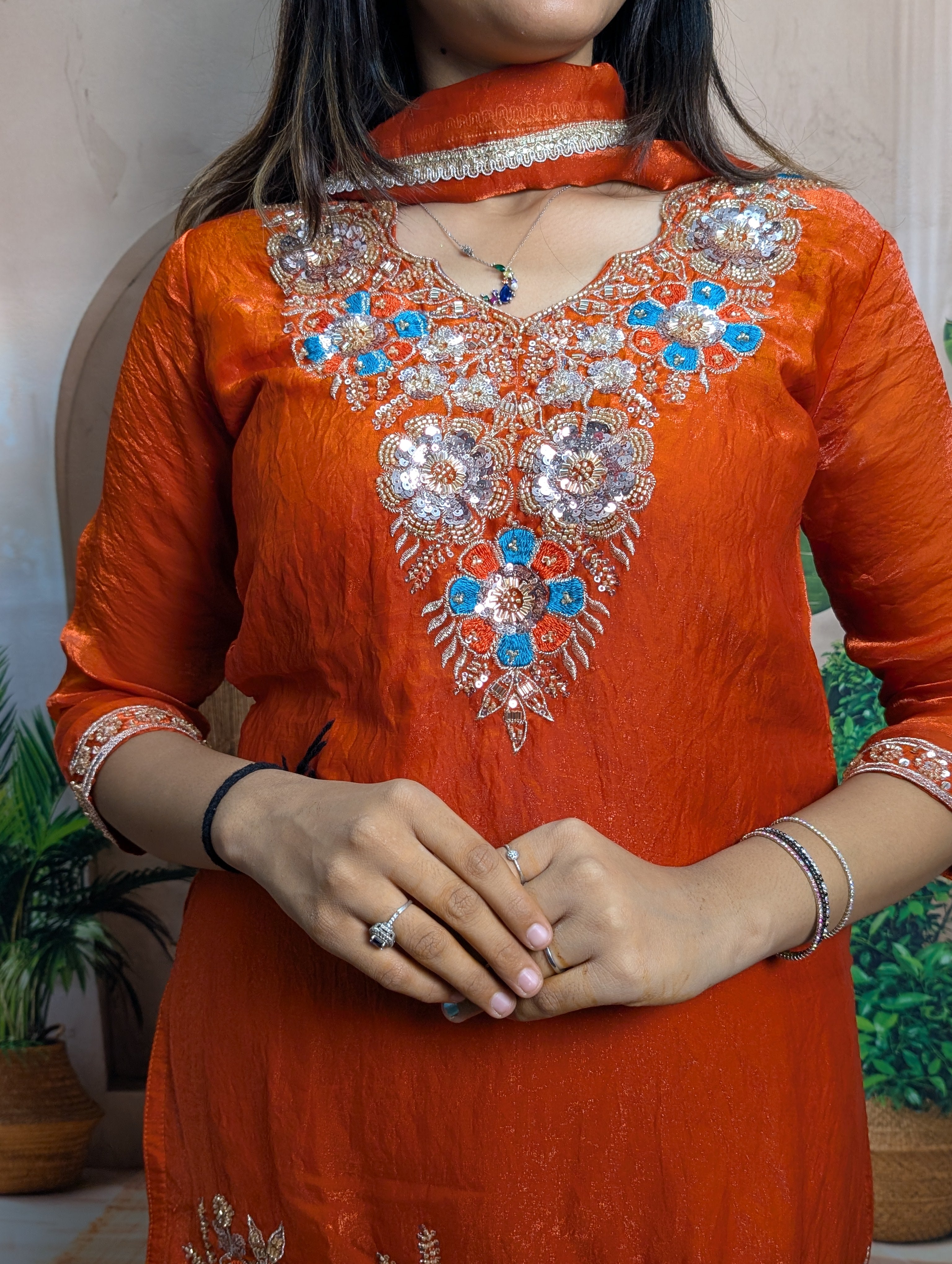 Premium rust orange heavy beads work closeup on Fendy fabric with intricate designer craftsmanship