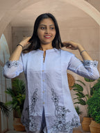 Premium sky embroidery work closeup on Royal Siffon fabric with elegant designer craftsmanship